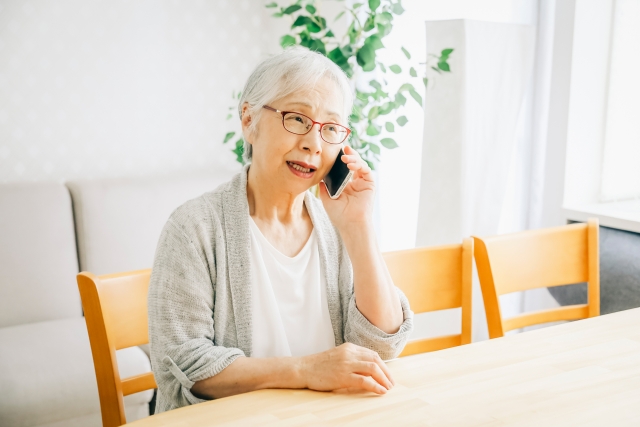 外壁塗装のご相談をするお客様